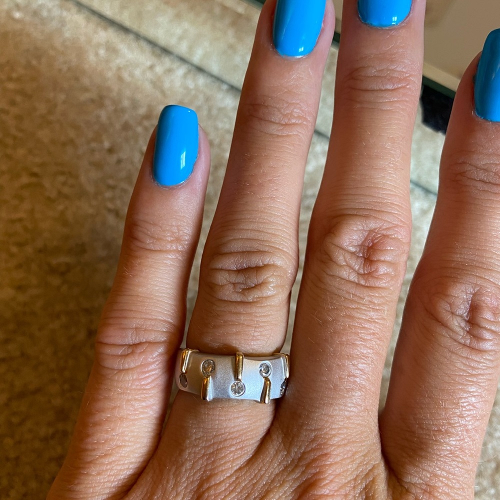 Sterling silver and 18 karat gold ring